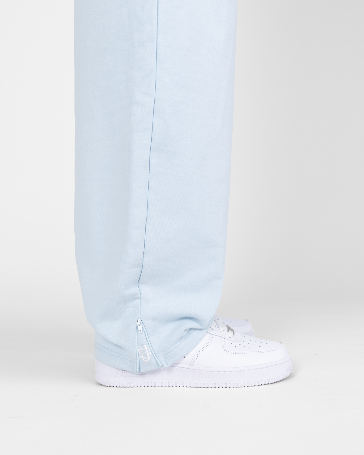 Jogging zippé SU – Bleu glacier